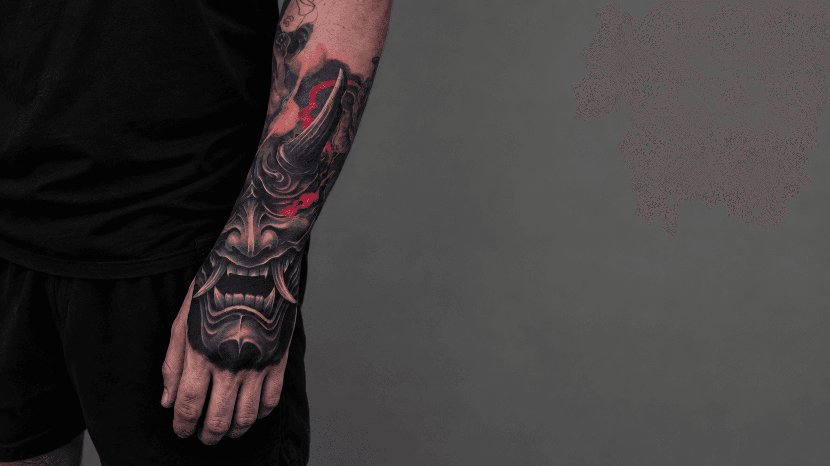 Hannya mask black and grey forearm and hand tattoo — Gorillaz Tattoo Art