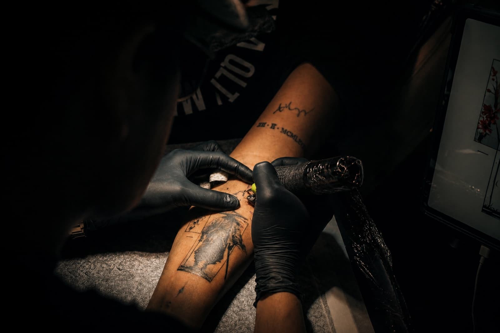 Tattoo session in progress at Gorillaz Tattoo Art