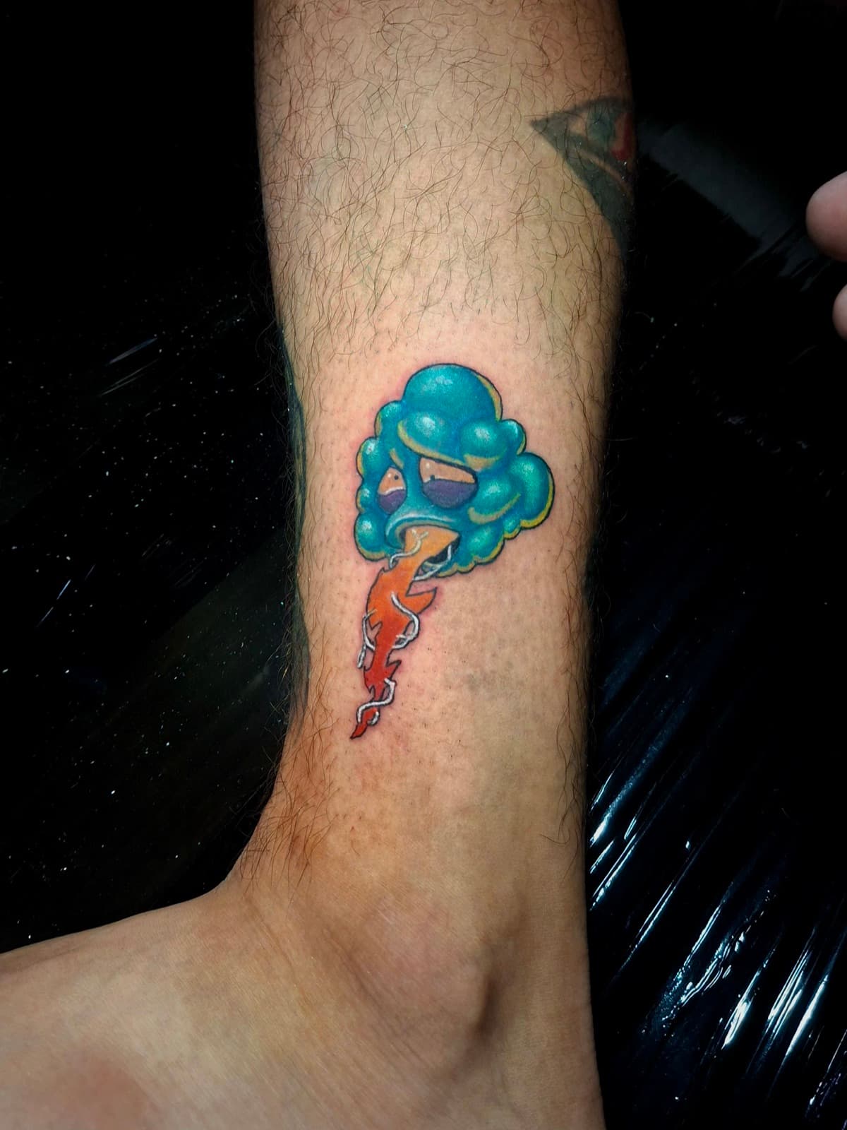 minimalist color storm cloud forearm tattoo by isaiah recongco — gorillaz tattoo art studio philippines
