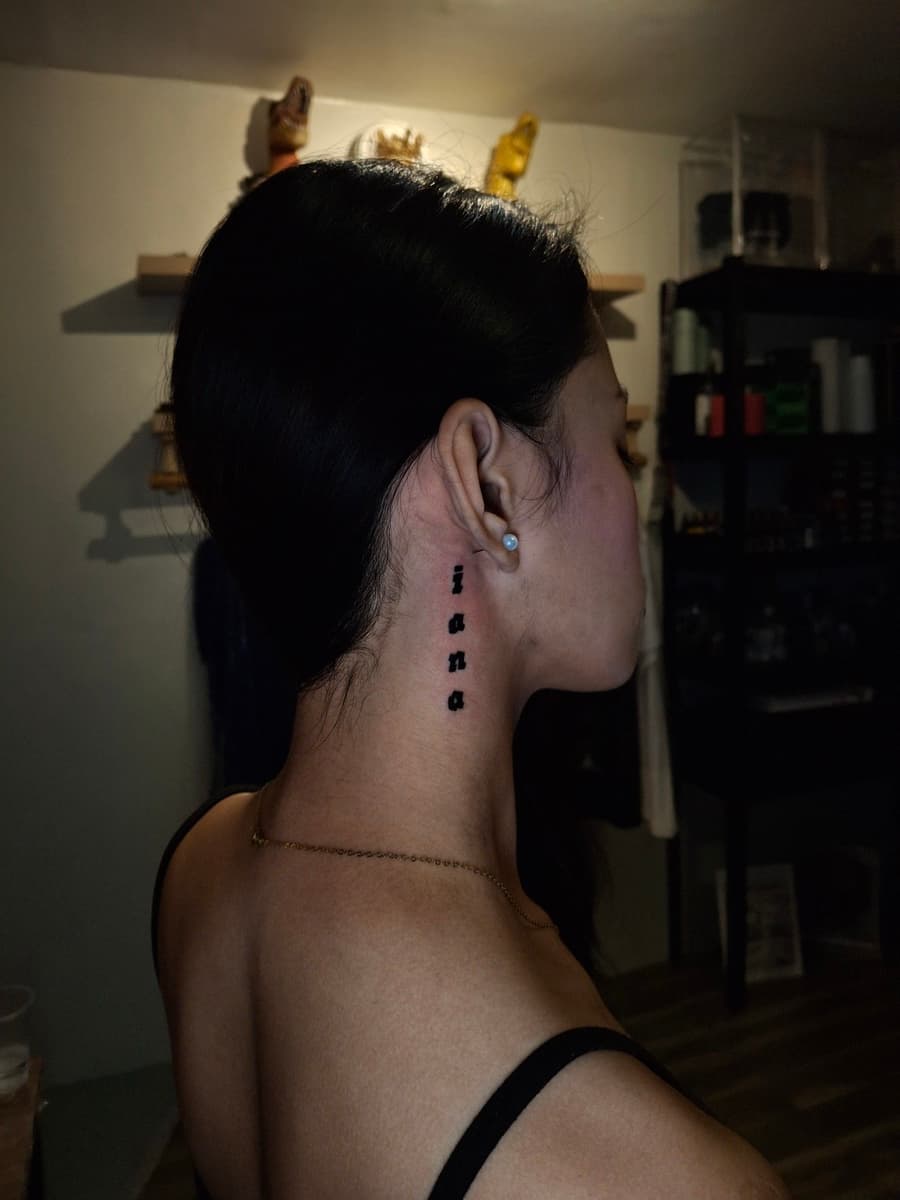 minimalist blackwork symbols neck tattoo by isaiah recongco — gorillaz tattoo art studio philippines